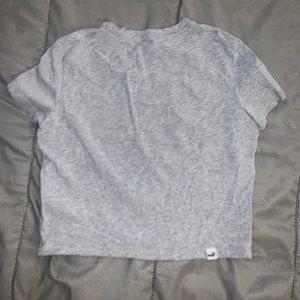 Cropped Puma workout shirt.